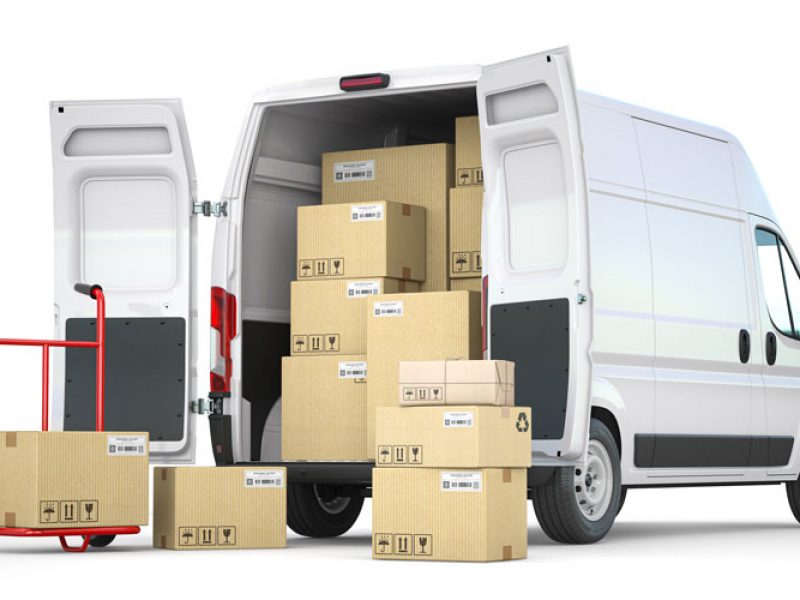 delivery-van-with-open-doors-and-hand-truck-with-c-2021-04-05-18-25-06-utc.jpg
